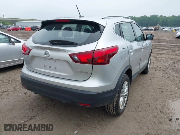 2017 Nissan Rogue SV with VIN JN1BJ1CR0HW120172, listed as a IAAI auction lot 42432543 with 116,938 mi miles and . Bid and sale history available at DreamBid. Image 4.