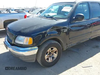 2003 Ford F-150 XLT with VIN 1FTRW07L83KC62296, listed as a IAAI auction lot 41689891 with 272,210 mi miles. Bid and sale history available at carsss.com. Image 6.