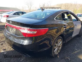 2014 Hyundai Azera with VIN KMHFG4JG7EA362185, listed as a IAAI auction lot 41877622 with 158,689 mi miles and . Bid and sale history available at DreamBid. Image 16.