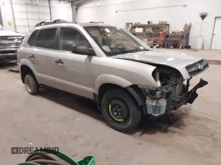 2006 Hyundai Tucson GL with VIN KM8JM12BX6U250937, listed as a IAAI auction lot 41529567 with 165,528 mi miles. Bid and sale history available at carsss.com. Image 1.