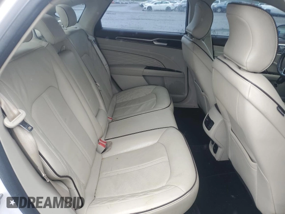 2017 Ford Fusion Titanium z VIN 3FA6P0SUXHR268559, wystawiony jako Copart lot #57456085 z przebiegiem 124 072 mil mil oraz Szkoda całkowita • Salvage title. Historia ofert i sprzedaży dostępna na DreamBid. Obrazek 10.