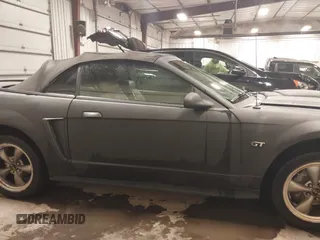 2002 Ford Mustang GT Deluxe z VIN 1FAFP45X92F176117, wystawiony jako IAAI lot #41619448 z przebiegiem 178 787 mil mil oraz . Historia ofert i sprzedaży dostępna na DreamBid. Obrazek 13.
