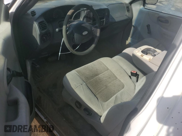 2003 Ford F-150 XL with VIN 1FTRF17W33NA54471, listed as a Copart auction lot 42594765 with 134,409 mi miles and Salvage Title. Bid and sale history available at DreamBid. Image 8.