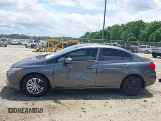 2012 Honda Civic LX z VIN 19XFB2F54CE038958, wystawiony jako IAAI lot #42136832 z przebiegiem 154 822 mil mil oraz . Historia ofert i sprzedaży dostępna na DreamBid. Obrazek 14.