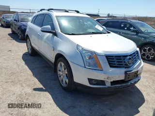 2014 Cadillac SRX Performance Collection z VIN 3GYFNFE35ES582897, wystawiony jako IAAI lot #41978361 z przebiegiem 144 116 mil mil oraz . Historia ofert i sprzedaży dostępna na DreamBid. Obrazek 1.