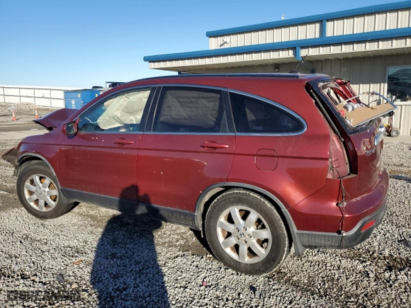 2009 Honda CR-V EX-L with VIN JHLRE38799C011508, listed as a Copart auction lot 87877865 with 0 mi miles and Salvage Title. Bid and sale history available at carsss.com. Image 2.