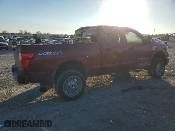 2016 Nissan Titan XD Platinum Reserve with VIN 1N6BA1F43GN502064, listed as a Copart auction lot 82686584 with 275,417 mi miles and Salvage Title. Bid and sale history available at carsss.com. Image 3.