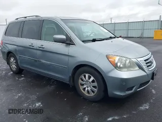 2009 Honda Odyssey EX-L with VIN 5FNRL38639B016460, listed as a IAAI auction lot 41594471 with 99,942 mi miles. Bid and sale history available at carsss.com. Image 1.