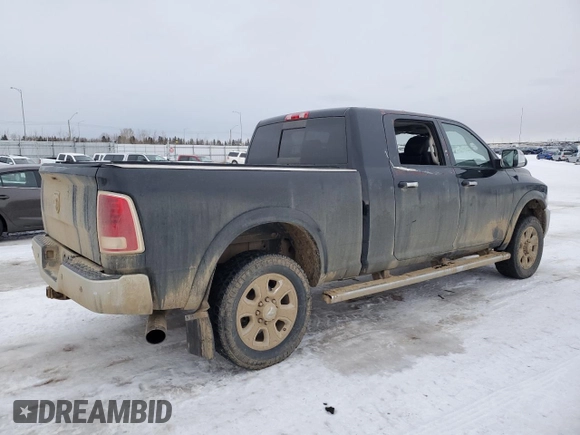 2014 Ram 3500 Laramie with VIN 3C63R3ML6EG325772, listed as a Copart auction lot 87158104 with 495,759 mi miles and Salvage Title. Bid and sale history available at carsss.com. Image 3.