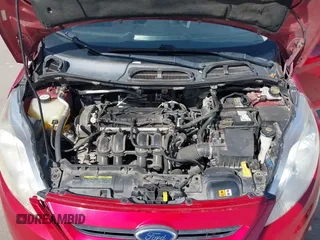 2012 Ford Fiesta SE z VIN 3FADP4EJ9CM140948, wystawiony jako IAAI lot #42301818 z przebiegiem 109 276 mil mil oraz . Historia ofert i sprzedaży dostępna na DreamBid. Obrazek 10.