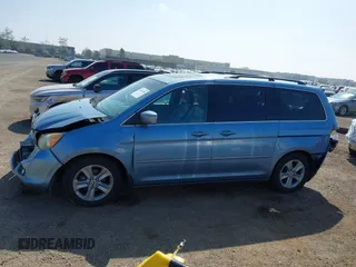 2010 Honda Odyssey Touring with VIN 5FNRL3H92AB056186, listed as a IAAI auction lot 41851386 with 199,109 mi miles. Bid and sale history available at carsss.com. Image 14.