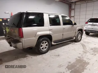 1999 Cadillac Escalade z VIN 1GYEK13RXXR413480, wystawiony jako IAAI lot #41552688 z przebiegiem 214 501 mil mil oraz . Historia ofert i sprzedaży dostępna na DreamBid. Obrazek 4.