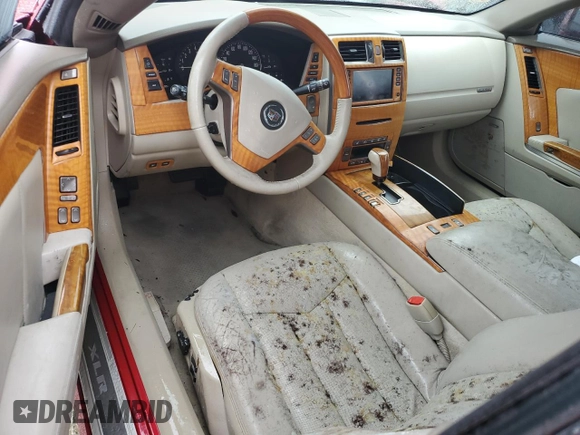 2005 Cadillac XLR z VIN 1G6YV34AX55600837, wystawiony jako Copart lot #75055604 z przebiegiem Nie podano mil oraz Szkoda całkowita • Salvage title. Historia ofert i sprzedaży dostępna na DreamBid. Obrazek 8.