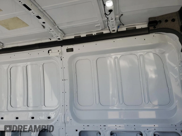 2024 Ford Transit Cargo with VIN 1FTBR1C8XRKA85811, listed as a Copart auction lot 74528914 with 1,725 mi miles and Salvage Title. Bid and sale history available at DreamBid. Image 11.