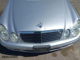 2005 Mercedes-Benz E-Class 3.2L with VIN WDBUF65J15A669561, listed as a IAAI auction lot 41888887 with 87,317 mi miles. Bid and sale history available at carsss.com. Image 6.