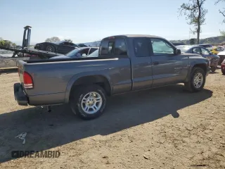 2002 Dodge Dakota z VIN 1B7GL32N62S551525, wystawiony jako Copart lot #48777025 z przebiegiem 91 438 mil mil oraz Czysty tytuł • Clean title. Historia ofert i sprzedaży dostępna na DreamBid. Obrazek 3.
