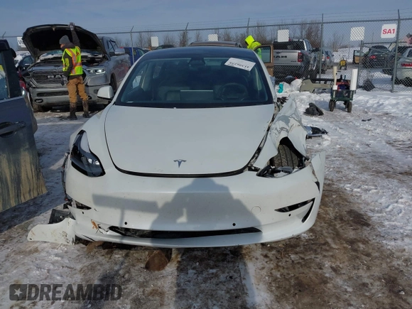 2022 Tesla Model 3 Long Range with VIN 5YJ3E1EB6NF114723, listed as a IAAI auction lot 41396258 with 2,179 mi miles and . Bid and sale history available at DreamBid. Image 11.