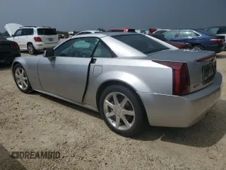 2006 Cadillac XLR z VIN 1G6YV36A365601441, wystawiony jako Copart lot #73945994 z przebiegiem Nie podano mil oraz Szkody całkowita. Historia ofert i sprzedaży dostępna na DreamBid. Obrazek 2.