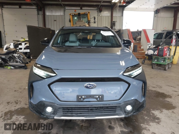 2023 Subaru Solterra Limited with VIN JTMABABA9PA021704, listed as a IAAI auction lot 41707243 with 13,519 mi miles and . Bid and sale history available at DreamBid. Image 13.