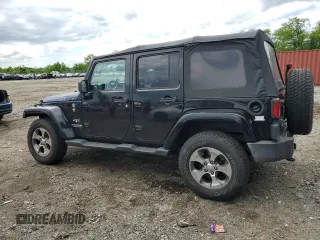 2016 Jeep Wrangler Unlimited Sahara with VIN 1C4BJWEG8GL150249, listed as a Copart auction lot 57574525 with 104,206 mi miles and Salvage title. Bid and sale history available at DreamBid. Image 2.