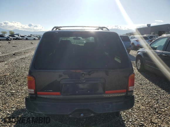 1999 Mercury Mountaineer with VIN 4M2ZU54EXXUJ35644, listed as a Copart auction lot 52770645 with 173,998 mi miles and Salvage title. Bid and sale history available at DreamBid. Image 6.