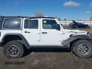 2024 Jeep Wrangler Rubicon with VIN 1C4PJXFG9RW307699, listed as a IAAI auction lot 42047562 with Not Provided miles. Bid and sale history available at carsss.com. Image 13.