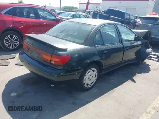 2001 Saturn SL with VIN 1G8ZK527X1Z238857, listed as a IAAI auction lot 42460370 with 76,231 mi miles and . Bid and sale history available at DreamBid. Image 4.