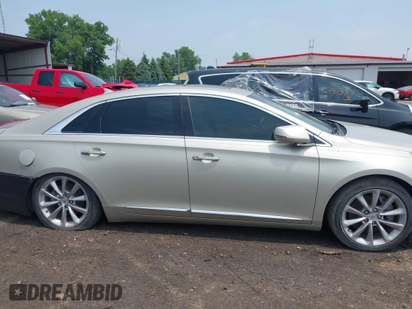 2014 Cadillac XTS Luxury z VIN 2G61M5S38E9291182, wystawiony jako IAAI lot #42495838 z przebiegiem 104 941 mil mil oraz . Historia ofert i sprzedaży dostępna na DreamBid. Obrazek 13.