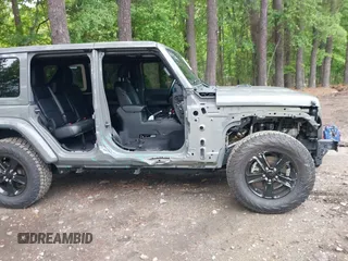 2021 Jeep Wrangler Unlimited Sahara with VIN 1C4HJXEG0MW703812, listed as a IAAI auction lot 42186089 with 50,349 mi miles and . Bid and sale history available at DreamBid. Image 6.