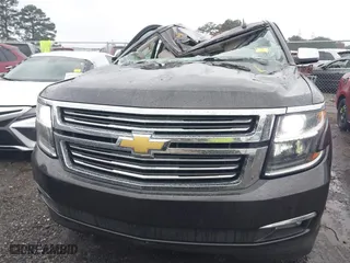 2015 Chevrolet Tahoe LTZ with VIN 1GNSCCKC7FR576236, listed as a IAAI auction lot 40794643 with 170,040 mi miles. Bid and sale history available at carsss.com. Image 6.