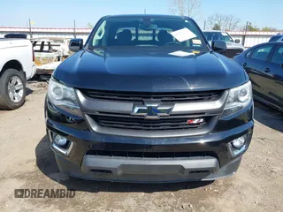 2018 Chevrolet Colorado 4WD Z71 z VIN 1GCGTDEN0J1173420, wystawiony jako IAAI lot #41971813 z przebiegiem 98 499 mil mil oraz . Historia ofert i sprzedaży dostępna na DreamBid. Obrazek 12.