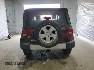 2010 Jeep Wrangler Sahara z VIN 1J4GA5D11AL106768, wystawiony jako Copart lot #56935745 z przebiegiem 143 212 mil mil oraz Szkoda całkowita • Salvage title. Historia ofert i sprzedaży dostępna na DreamBid. Obrazek 6.