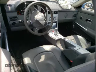 2005 Chrysler Crossfire Limited z VIN 1C3AN65L95X031875, wystawiony jako Copart lot #67713144 z przebiegiem 34 812 mil mil oraz Szkoda całkowita • Salvage title. Historia ofert i sprzedaży dostępna na DreamBid. Obrazek 8.