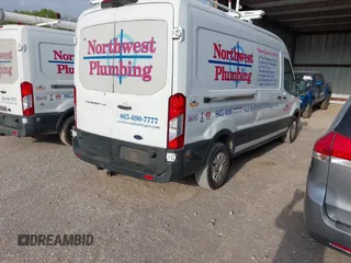 2019 Ford Transit with VIN 1FTYR2CM1KKA87353, listed as a IAAI auction lot 42074425 with 147,825 mi miles. Bid and sale history available at carsss.com. Image 4.