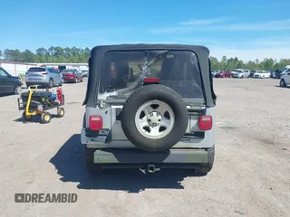 2006 Jeep Wrangler X with VIN 1J4FA39S86P743660, listed as a IAAI auction lot 41890339 with 198,099 mi miles and . Bid and sale history available at DreamBid. Image 16.