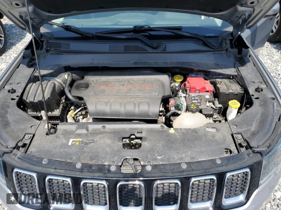 2020 Jeep Compass Latitude z VIN 3C4NJDBB3LT100870, wystawiony jako Copart lot #55840125 z przebiegiem 58 999 mil mil oraz Szkoda całkowita • Salvage title. Historia ofert i sprzedaży dostępna na DreamBid. Obrazek 11.