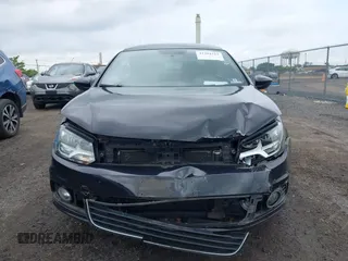 2014 Volkswagen Eos Sport with VIN WVWBW8AH2EV003356, listed as a IAAI auction lot 42394312 with 70,448 mi miles and . Bid and sale history available at DreamBid. Image 13.