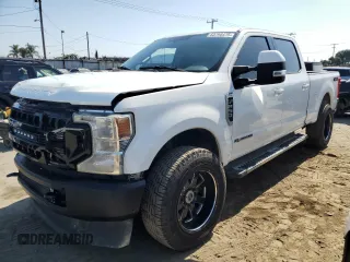 2020 Ford F-250 XL with VIN 1FT7W2BT2LED04826, listed as a Copart auction lot 63795475 with 140,668 mi miles and Salvage title. Bid and sale history available at DreamBid. Image 1.