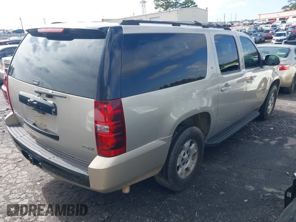 2007 Chevrolet Suburban LS with VIN 1GNFC16047J252702, listed as a IAAI auction lot 41576927 with 401,122 mi miles and . Bid and sale history available at DreamBid. Image 4.