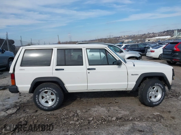 1996 Jeep Cherokee Sport with VIN 1J4FJ68S6TL234012, listed as a IAAI auction lot 41571658 with 255,817 mi miles. Bid and sale history available at carsss.com. Image 14.