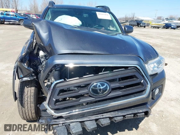 2021 Toyota Tacoma 4WD SR with VIN 3TMCZ5AN7MM442237, listed as a IAAI auction lot 41993450 with 30,148 mi miles. Bid and sale history available at carsss.com. Image 6.