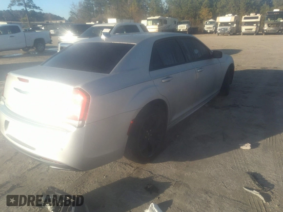 2022 Chrysler 300 Touring L with VIN 2C3CCADG4NH163145, listed as a IAAI auction lot 41188646 with 65,068 mi miles. Bid and sale history available at carsss.com. Image 4.