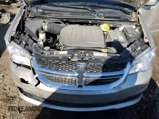 2016 Dodge Grand Caravan SXT with VIN 2C4RDGCG5GR219517, listed as a Copart auction lot 50052405 with 104,552 mi miles and Salvage Title. Bid and sale history available at DreamBid. Image 12.