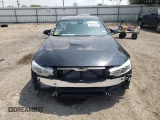 2016 BMW M4 with VIN WBS3R9C54GK336210, listed as a Copart auction lot 49378793 with 51,658 mi miles. Bid and sale history available at carsss.com. Image 5.