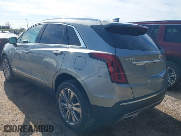 2025 Cadillac XT5 FWD Premium Luxury with VIN 1GYKNCRS1SZ120351, listed as a IAAI auction lot 41334881 with 4,915 mi miles. Bid and sale history available at carsss.com. Image 3.