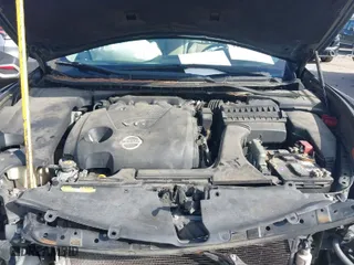 2014 Nissan Maxima 3.5 SV w/Premium Pkg with VIN 1N4AA5AP4EC482087, listed as a IAAI auction lot 41253825 with 107,820 mi miles. Bid and sale history available at carsss.com. Image 10.