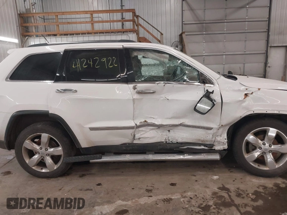 2013 Jeep Grand Cherokee Overland with VIN 1C4RJFCG7DC581808, listed as a IAAI auction lot 41242922 with 187,442 mi miles. Bid and sale history available at carsss.com. Image 14.