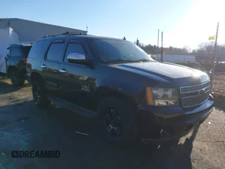 2011 Chevrolet Tahoe LS with VIN 1GNSCAE06BR263372, listed as a IAAI auction lot 41328172 with 223,093 mi miles and . Bid and sale history available at DreamBid. Image 1.