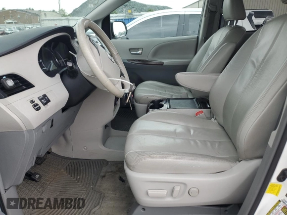 2012 Toyota Sienna XLE AAS with VIN 5TDYK3DC0CS212613, listed as a Copart auction lot 62317765 with 258,124 mi miles and Salvage title. Bid and sale history available at DreamBid. Image 7.