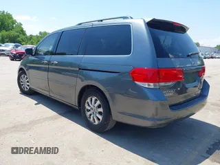 2010 Honda Odyssey EX-L z VIN 5FNRL3H76AB071871, wystawiony jako IAAI lot #42214867 z przebiegiem 255 116 mil mil oraz . Historia ofert i sprzedaży dostępna na DreamBid. Obrazek 3.
